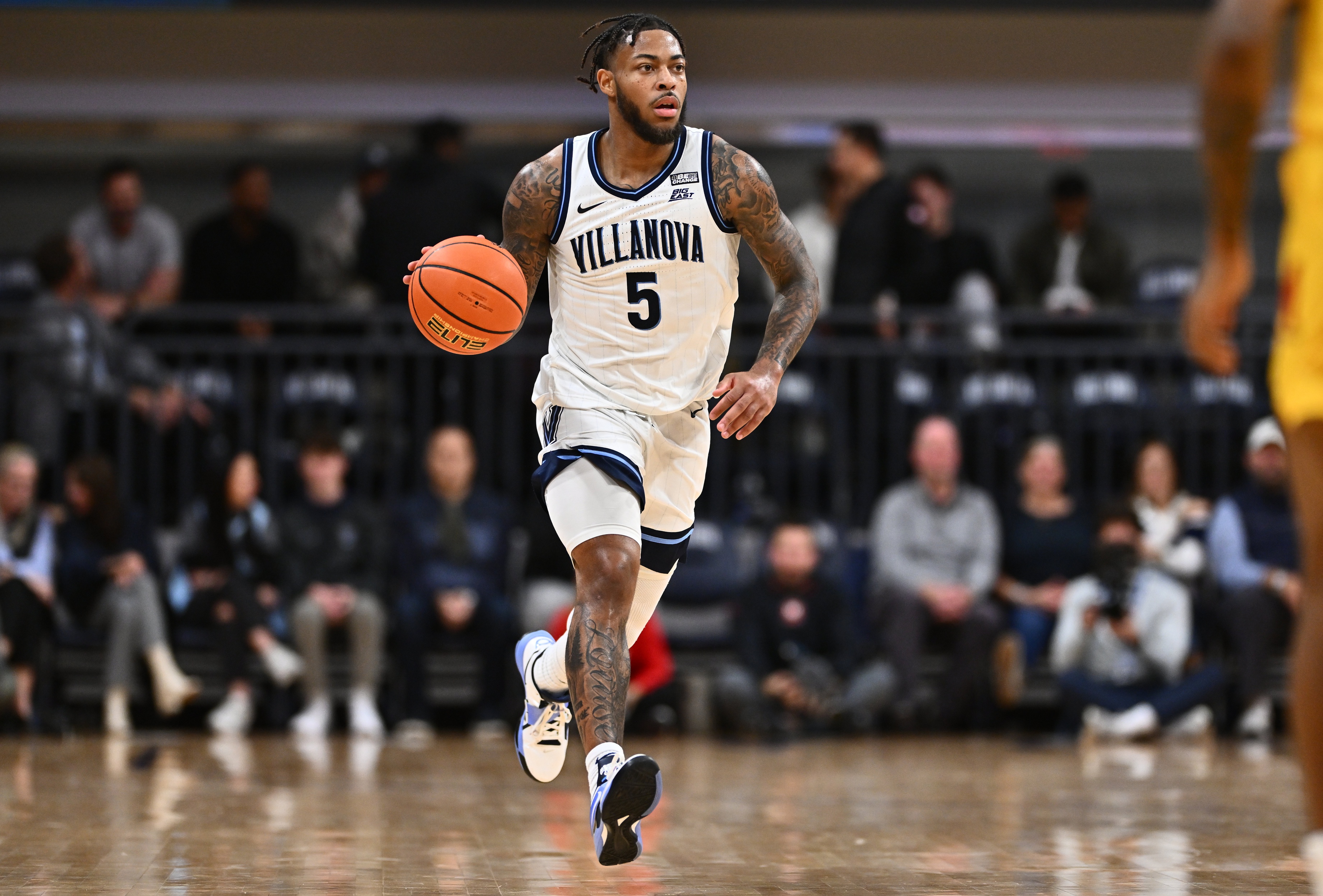 college basketball picks Justin Moore Villanova Wildcats predictions best bet odds