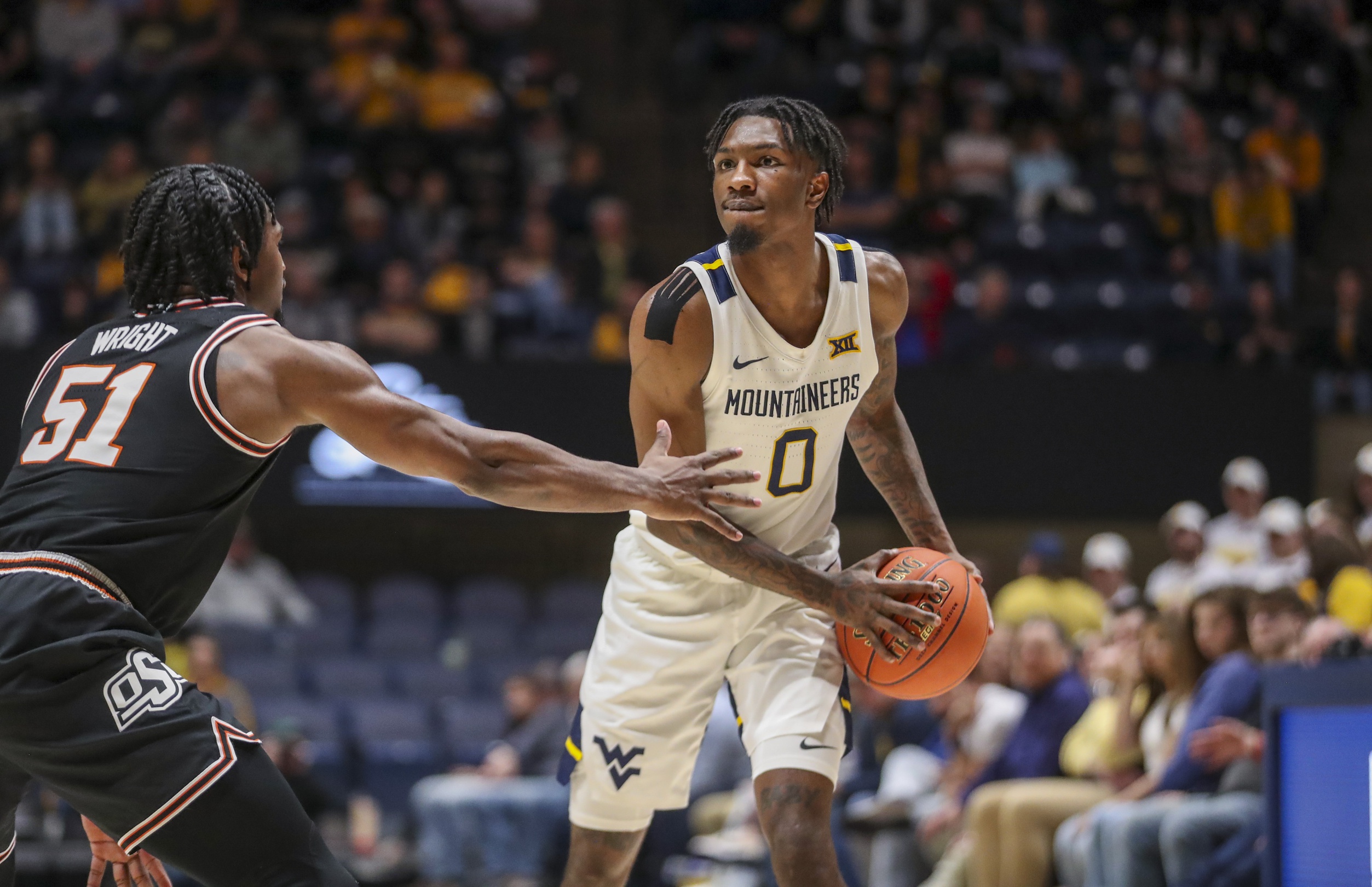 college basketball picks Kedrian Johnson West Virginia Mountaineers predictions best bet odds