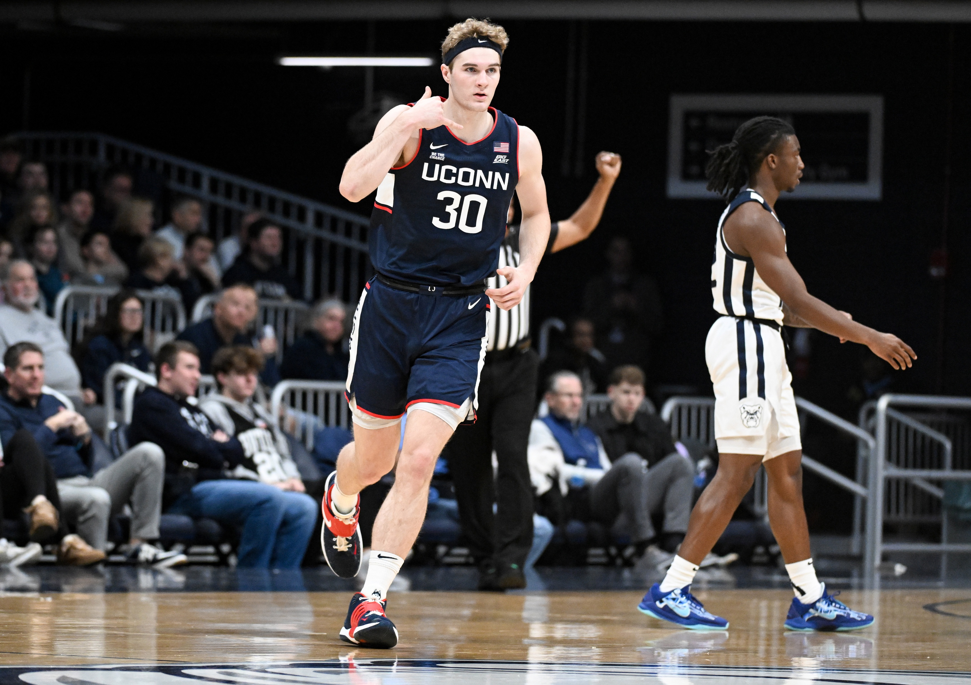 college basketball picks Liam McNeeley Connecticut Huskies predictions best bet odds