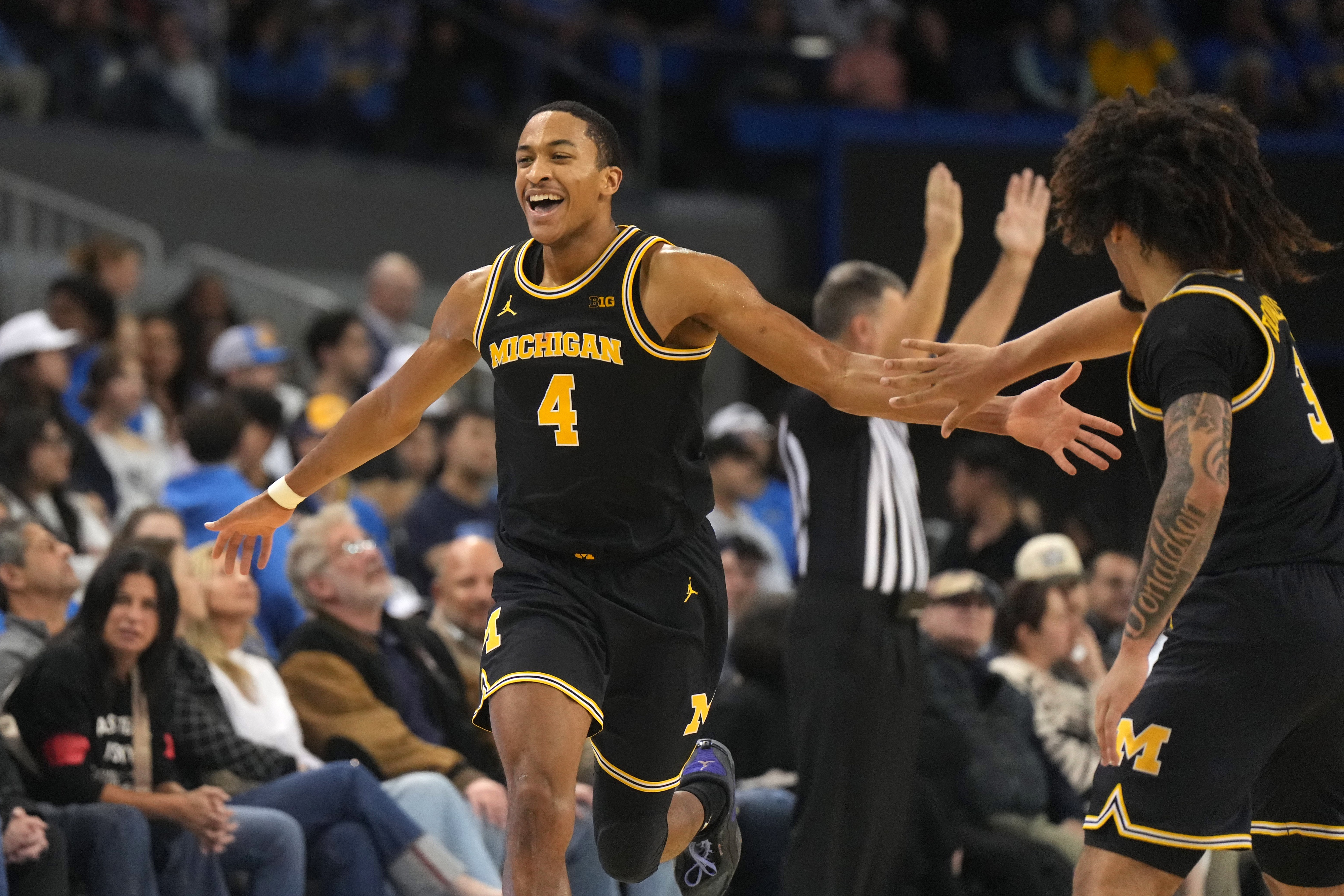 college basketball picks Nimari Burnett Michigan Wolverines predictions best bet odds