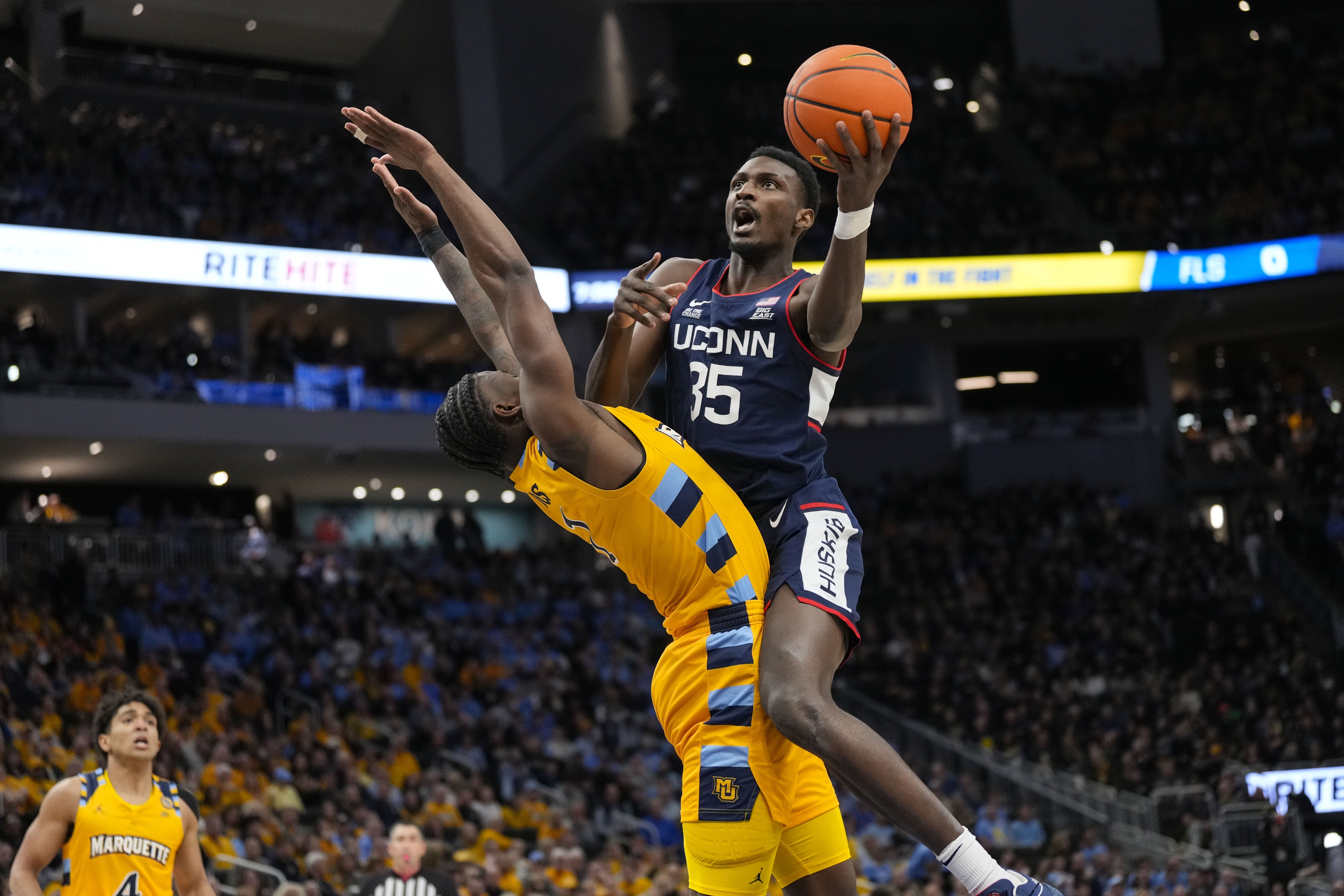 college basketball picks Samson Johnson Connecticut Huskies predictions best bet odds