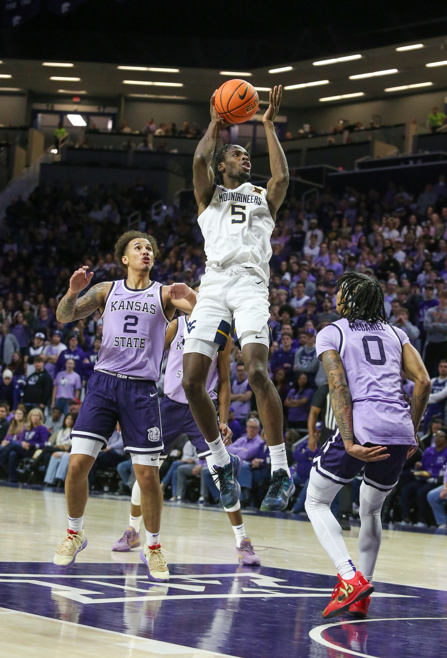 college basketball picks Toby Okani West Virginia Mountaineers predictions best bet odds