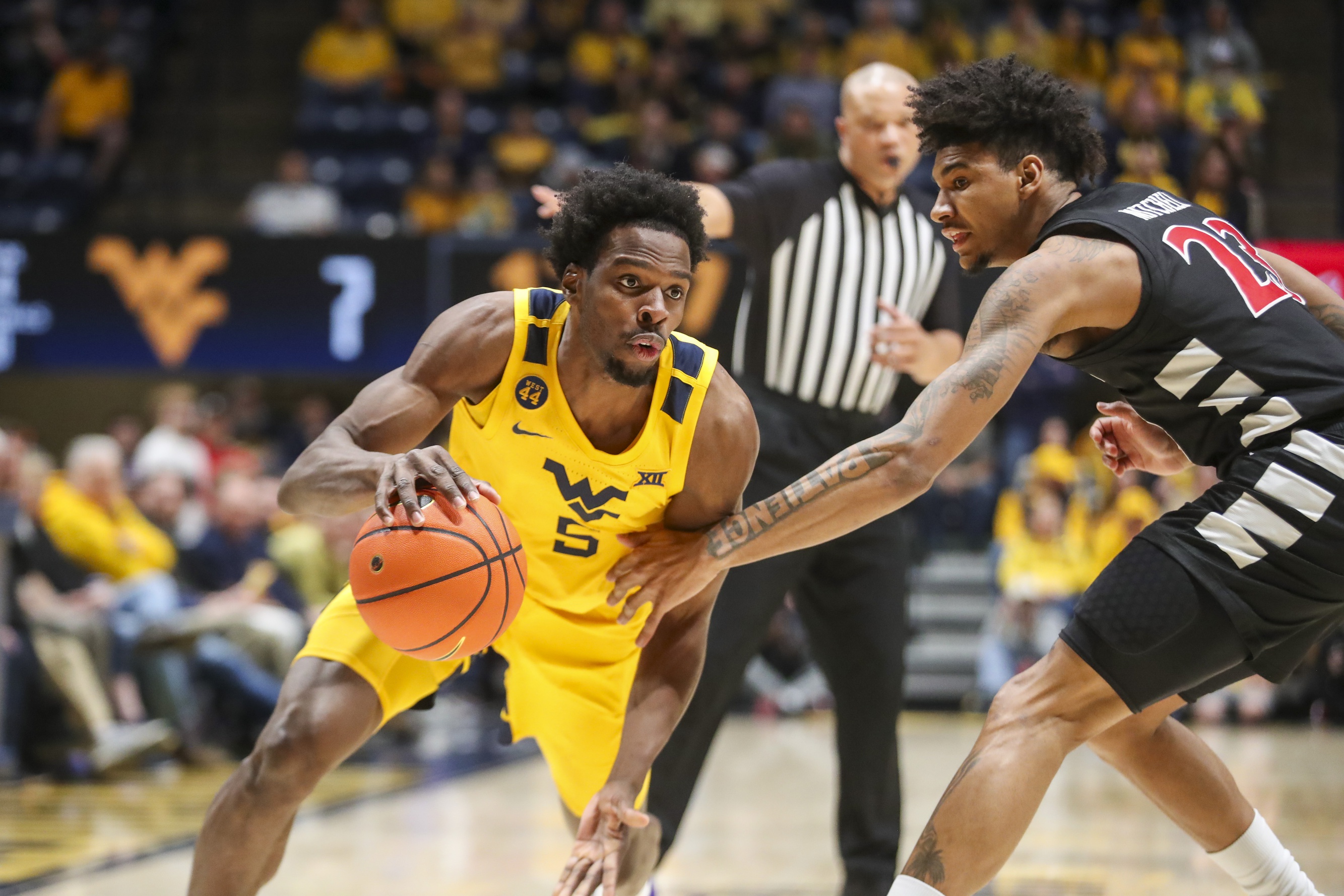 college basketball picks Toby Okani West Virginia Mountaineers predictions best bet odds