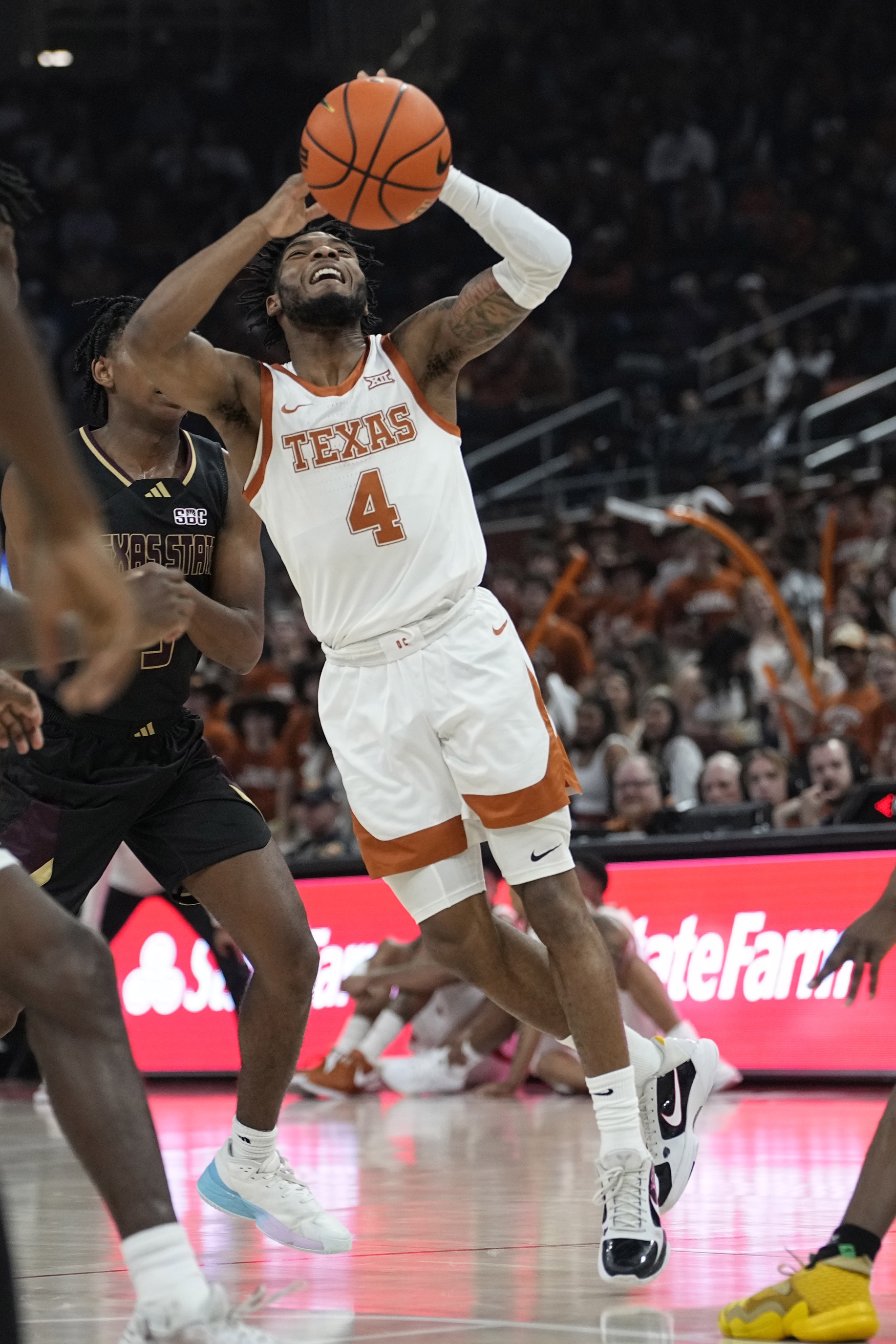 college basketball picks Tyrese Hunter Texas Longhorns predictions best bet odds