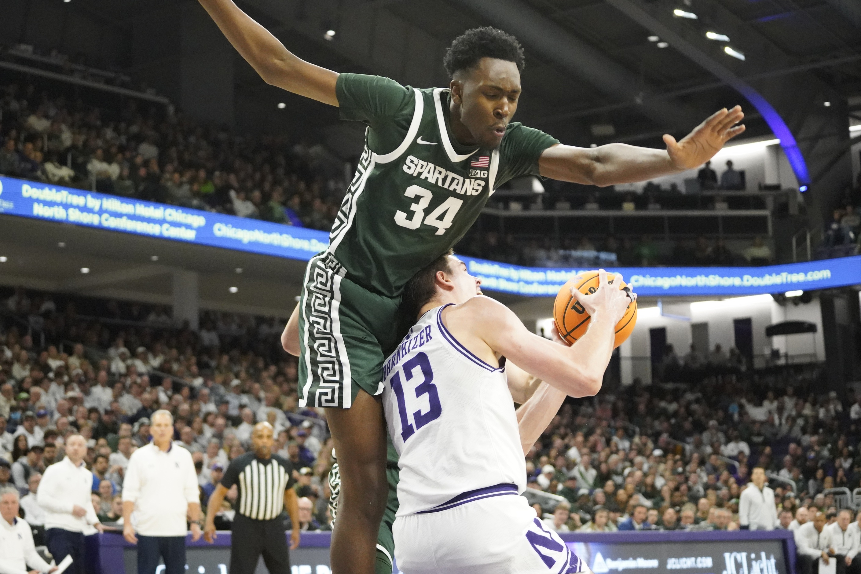college basketball picks Xavier Booker Michigan State Spartans predictions best bet odds