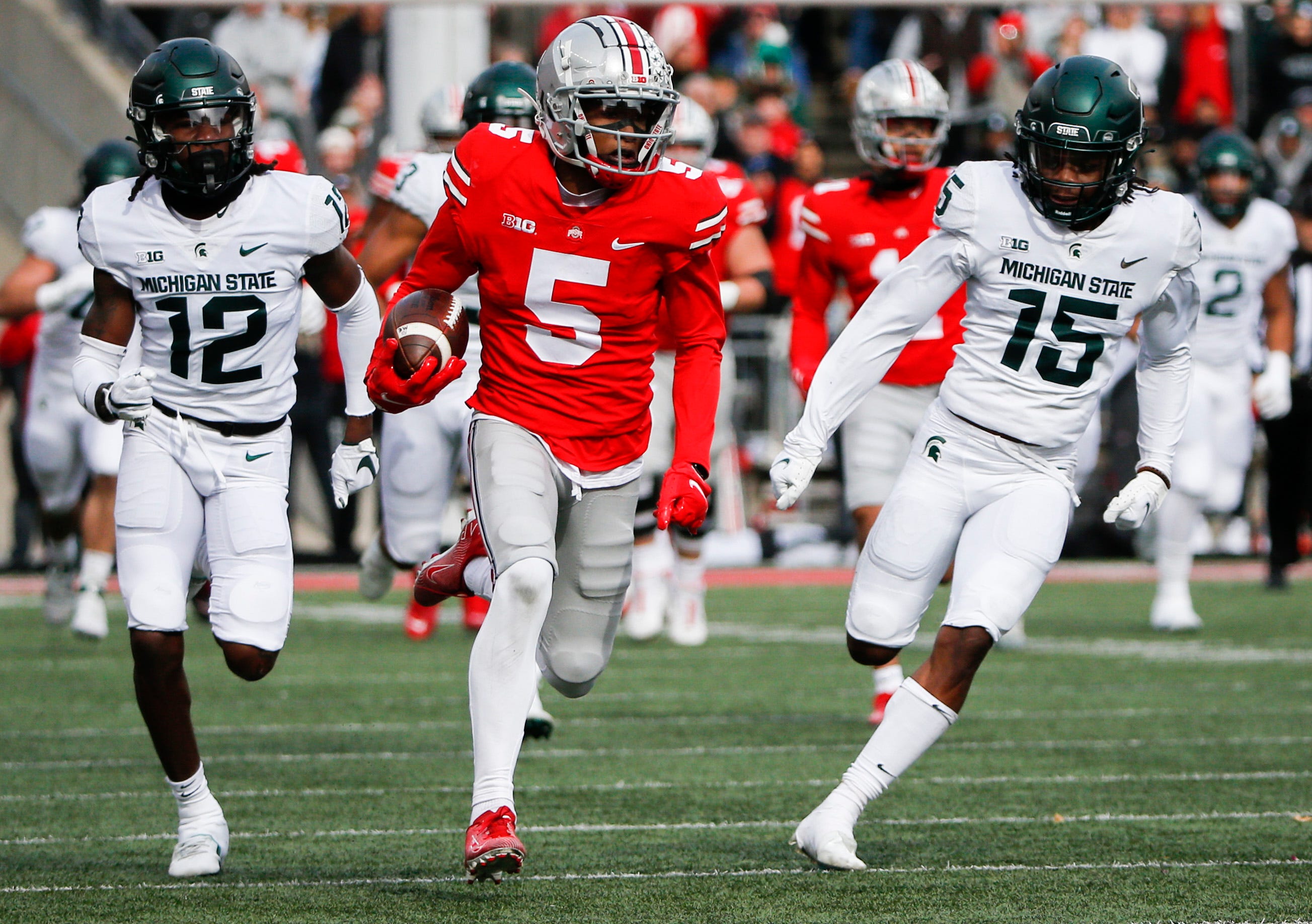 college football picks Garrett Wilson ohio state buckeyes predictions best bet odds