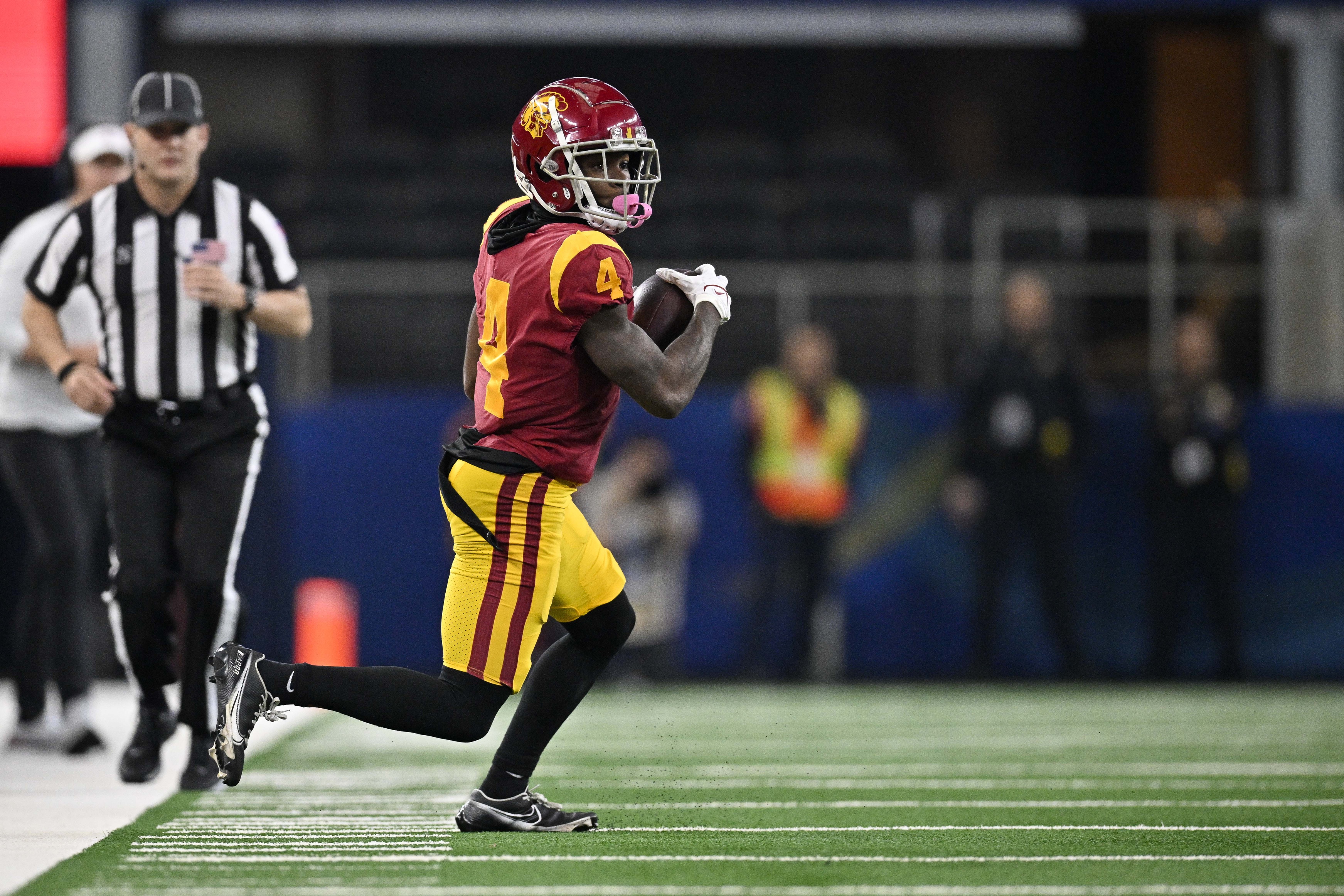 college football picks Mario Williams USC Trojans predictions best bet odds