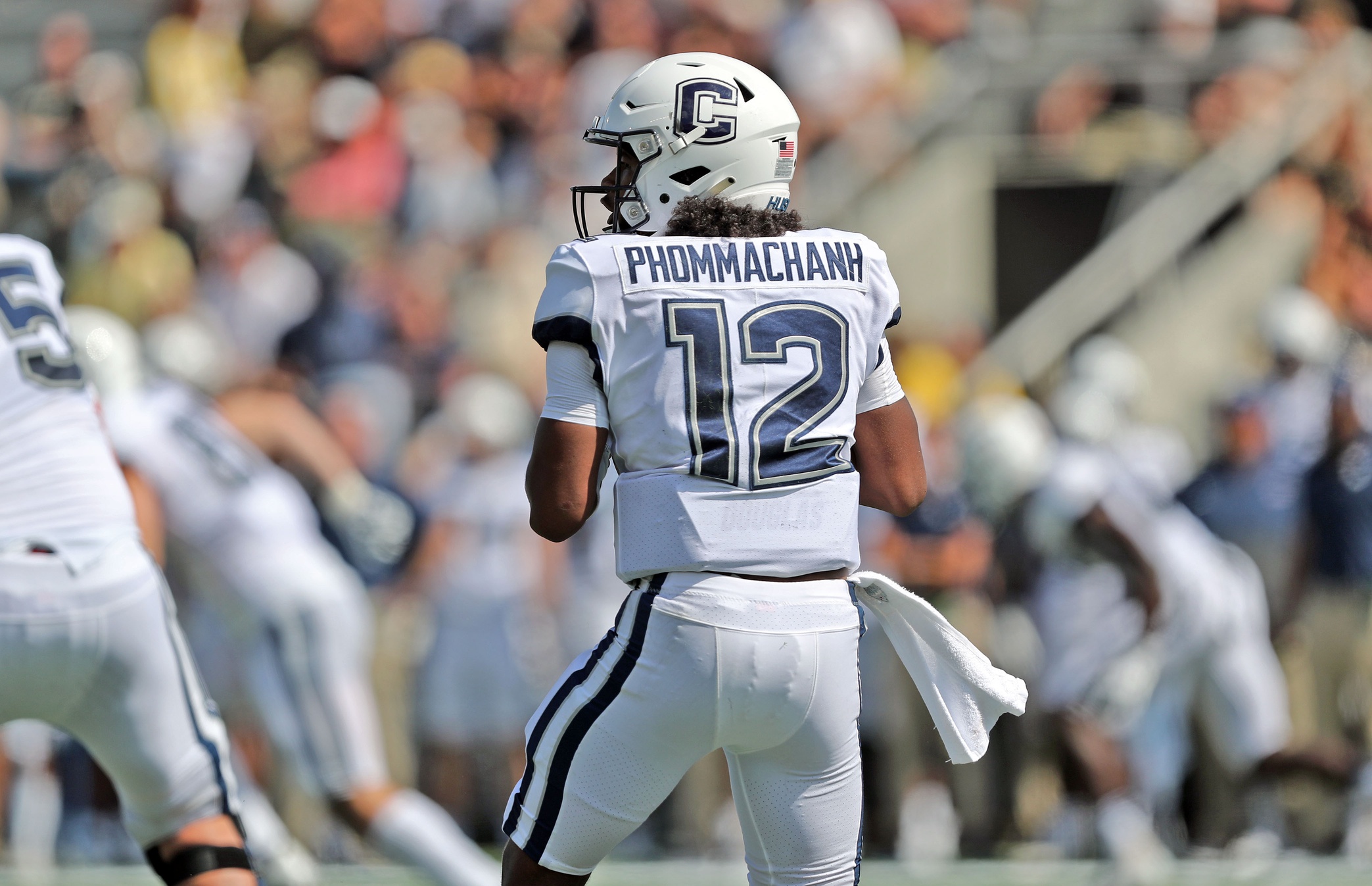 college football picks Tyler Phommachanh connecticut huskies predictions best bet odds