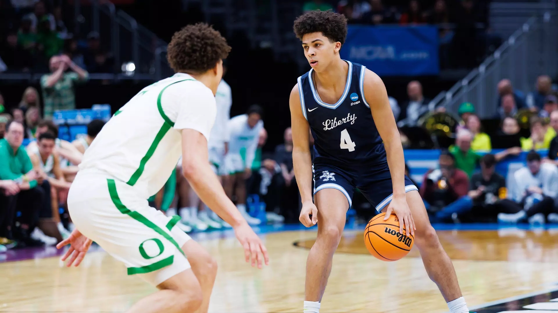 College basketball predictions Brett Decker Jr Liberty Flames best bets odds