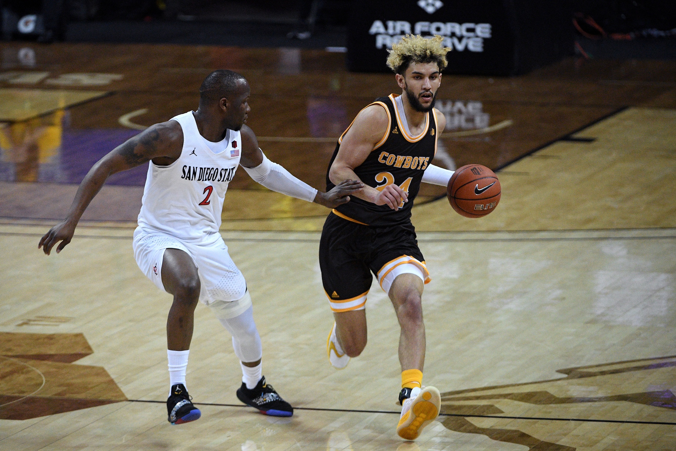 college basketball picks Hunter Maldonado Wyoming Cowboys predictions best bet odds
