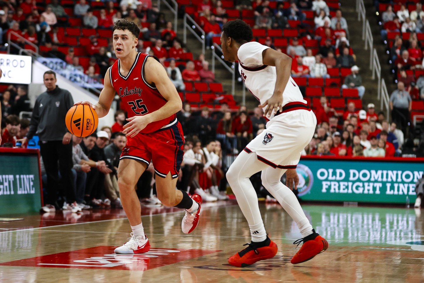 NCAA basketball picks Zach Cleveland Liberty Flames predictions best odds
