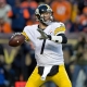 Steelers QB BEN ROETHLISBERGER readies to throw a pass during the 2nd. Half at Sports Authority Field at Mile High Sunday afternoon. The Broncos beat the Steelers 23-16 and advance the the AFC Championship game against the Patriots next week.