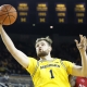 college basketball picks Hunter Dickinson Michigan Wolverines predictions best bet odds