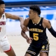 college basketball picks Jamal Bey Washington Huskies predictions best bet odds