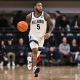 college basketball picks Justin Moore Villanova Wildcats predictions best bet odds