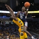 college basketball picks Samson Johnson Connecticut Huskies predictions best bet odds