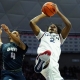 college basketball picks Tristen Newton Connecticut Huskies predictions best bet odds