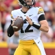 college football picks Cade McNamara Iowa Hawkeyes predictions best bet odds