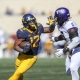 college football picks CJ Donaldson West Virginia Mountaineers predictions best bet odds