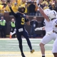 college football picks J.J. McCarthy michigan wolverines predictions best bet odds