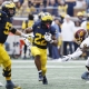 college football picks Justice Haynes Michigan Wolverines predictions best bet odds