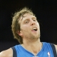 Dirk Nowitzki takes a shot against the Spurs. 
