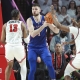 Making bracket picks based on college basketball futures odds Hunter Dickinson Kansas