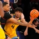 March Madness upset predictions Stevie Mitchell Marquette Golden Eagles