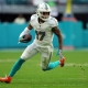 NFL betting predictions Week 16 opening line report Jaylen Waddle Miami Dolphins